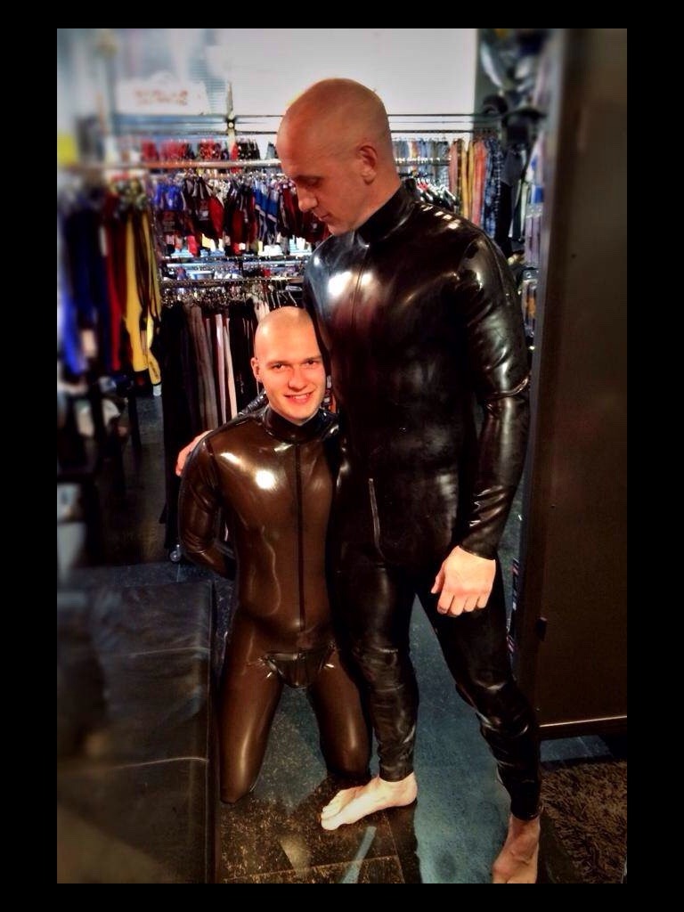 punkerskinhead:  sexy couple in rubber in a sexy shop