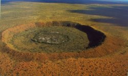 coolthingoftheday:  This is the Wolfe Creek Crater in Australia’s outback. According to scientists studying the site, the space rock likely touched down around 300,000 years ago. The diameter of the crater stretches to almost 3,000 feet, and is almost