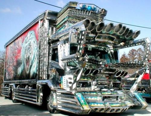 odditiesoflife:The Amazing Dekotora Trucks of JapanCovered in chrome and gleaming neon, big rigs fro