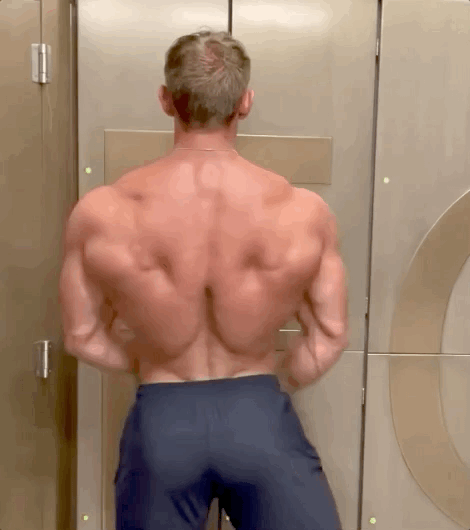 hugemuscle: Sexy as fuck muscle jock showing off his shredded back. 