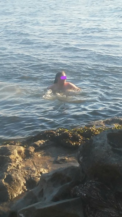 My spellbinding sea goddess takes a dip in the cool waters of the ocean at the beach last year