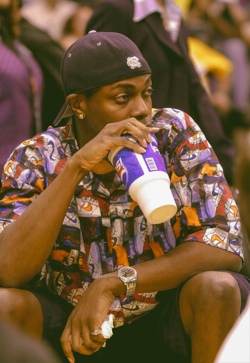 Chris Tucker photographed by Jed Jacobsohn while attending a playoff game between the Los Angeles La