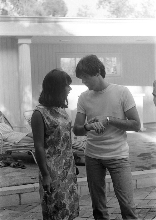 thedissenters:Brian Epstein’s secretary Diana Vero & Paul McCartney at a rented house in Brown Canyon in Bel Air, CA | 27 August 1964 