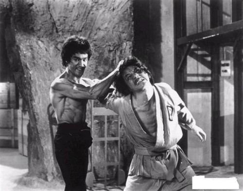 historicaltimes: Jackie Chan gets beat up by Bruce Lee in Enter The Dragon, 1973 via reddit