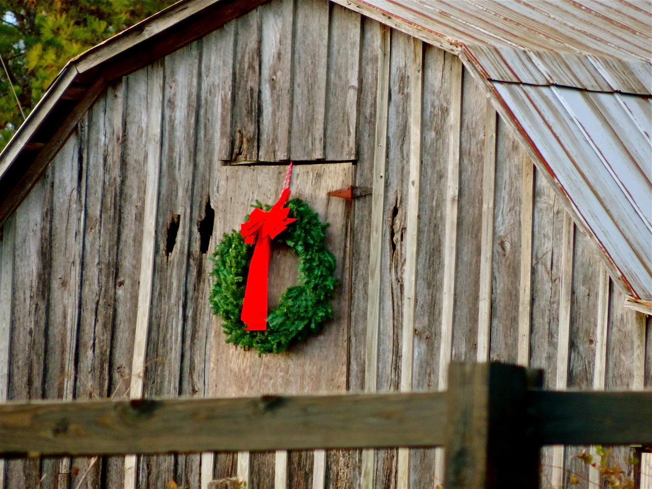 A little holiday cheer on a hay loft’s door
Old barn’s hay loft door / Carrollton, Georgia / Julie Cook / 2014