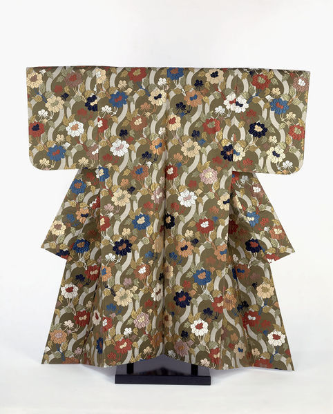 Japanese Noh theatre costume;a woman’s robe called “Karaori" decorated with peonies and undulat