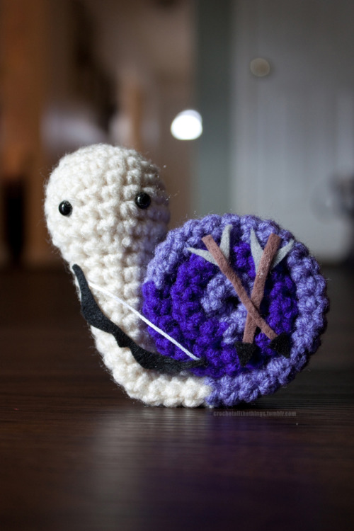 thingsfortwwings:[Photoset: Crocheted snails with costumes based on the MCU Avengers + Nick Fury and