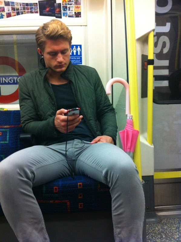 guys-with-bulges:  Tube Bulge. And A Very Pink Brolli. (via Sticky Street Crush