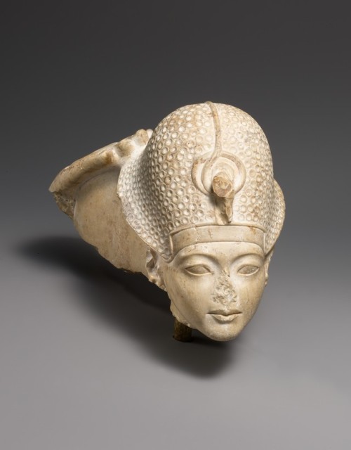Limestone head of the 18th Dynasty pharaoh Tutankhamun (r. ca. 1334-1325 BCE) being caressed by the 