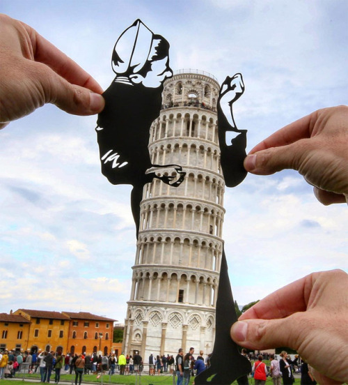 archiemcphee:  Meanwhile London-based artist Rich McCor, aka paperboyo (previously featured here), continues to travel the world using simple paper cutouts to cleverly transform famous landmarks and other buildings into awesome new attractions. Suddenly