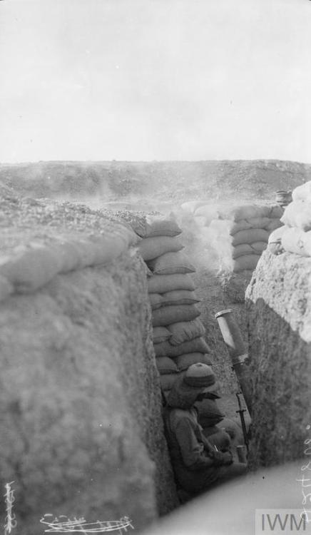 scrapironflotilla: Loading and firing a 6 Inch Newton mortar from a trench somewhere in Mesopotamia,