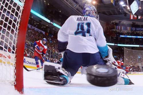 Jakub Voracek of Team Czech Republic gets the puck past Team Europe goalie Jaroslav Halak during the