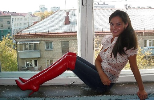 You can tell she’s proud of her red boots