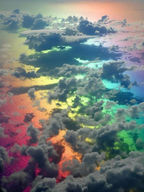 phindsy:  painandcats:  [two images taken from above the clouds. A rainbow is visible below the clouds.]  The sky is gay confirmed 