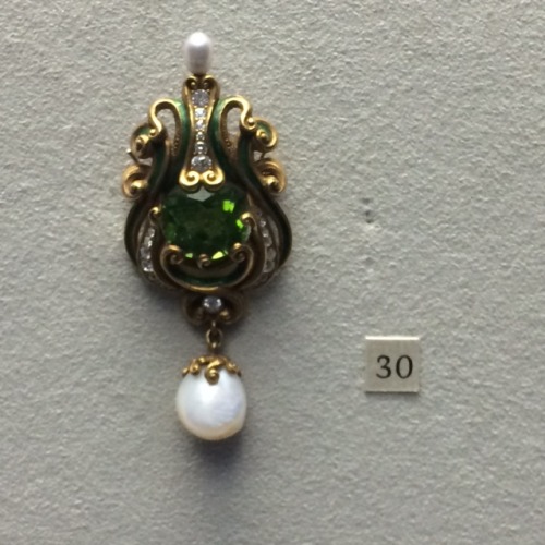 Gold, peridot, enamel, diamonds and pearls. New York circa 1900. It looks like a similar pendant fro