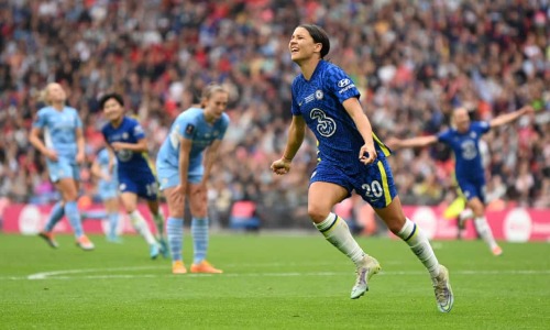 Sam Kerr scores a brace against Manchester City in the FA Cup final.First goal:Brother: What a goal.