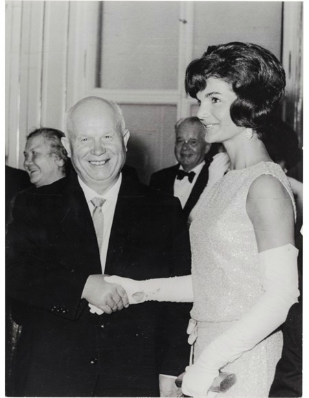 First Lady, Jacqueline Kennedy shaking hands with Soviet Union Prime Minister, Nikita Khrushchev