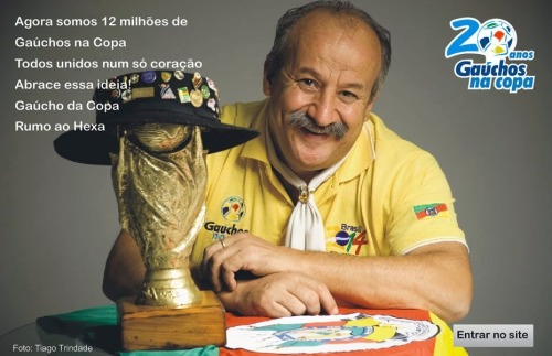 Trivia from the “sad guy with a mythical moustache holding the World Cup trophy”, and some happy pictures of him! His name is Clovis Acosta Fernandes, also known as “Gaúcho da Copa”. He’s 59 years old and works as a real