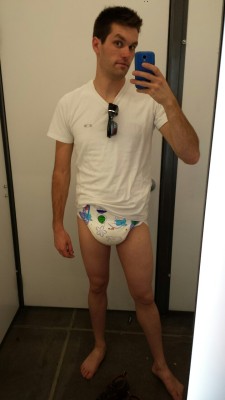 codydl88:  Shopping day. Salmon shorts! Yay!  Codydl88 is too damn cute! Sadly he only wets his pants while diapered, but I had to share his diapered dressing room pics because he is one very handsome diaper man. 
