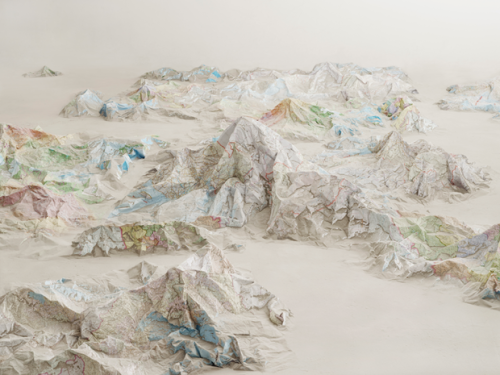 mentalflossr:This Artist Turns Recycled Maps Into Mountains