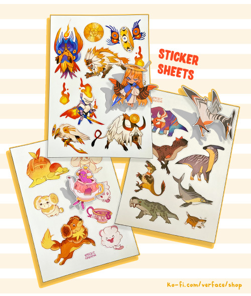 Second image ID: Artwork for three sticker sheets. One sheet depicts cute, stylized angelic beings, the second an array of cretaceous animals, and the third is a set of food-based Pokemon.