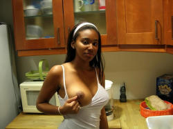 homemadeebonybabes:  Ebony girl flashes boob in kitchen …