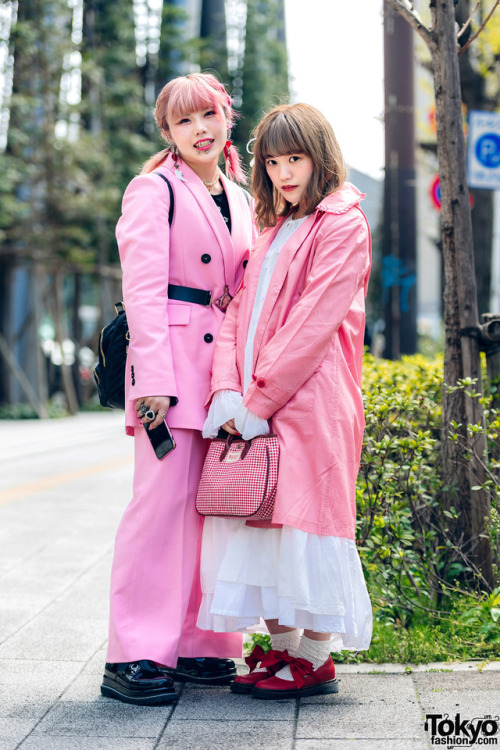 18-year-old Japanese fashion students Natsumi and Moka wearing pink styles on the street in Tokyo. N