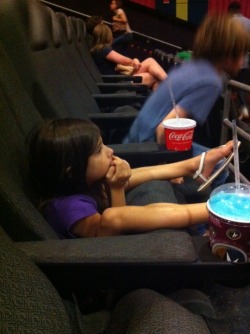 niknak79:  She was just too light to keep the seat down, so she watched the entire movie like this 