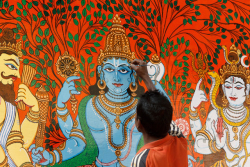 Artist working on a trimurti mural, Odisha, photo by RunningRalph