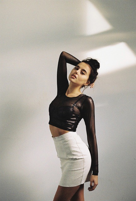 americanapparel:  Lauren in the Shiny Mesh Long Sleeve Crop Top, the Lame Stretch Bustier with the Printed Leather Mini Skirt by American Apparel. Shop our leather collection here!  this girl is gorgeous!