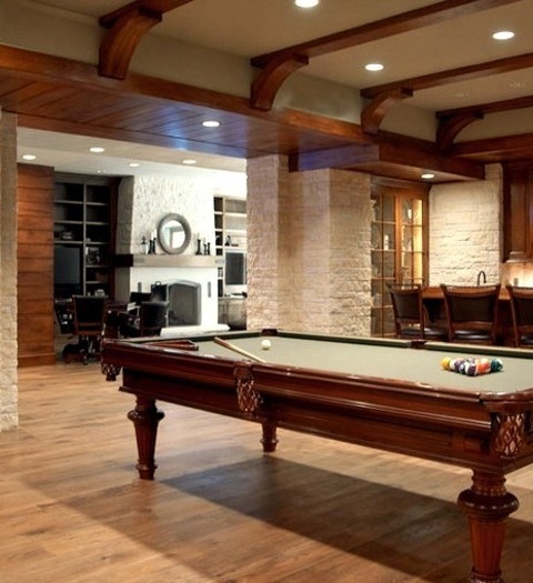 Basement LookoutLarge Elegant Look-out Medium Tone Wood Floor And Brown Floor Basement Photo With Beige