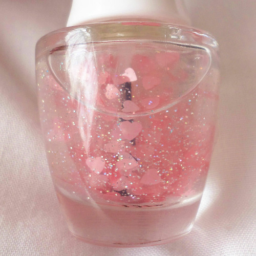 xpinkrosehimex:  How cute is this nail polish, Glitter with pink hearts ❤