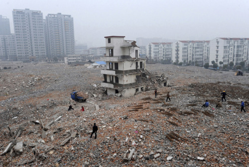 theatlantic:  Read more:And Then There Was OneAcross China, where new developments are keeping pace with the rapidly growing economy, reports continue to surface so-called “nail houses.” These properties, standing alone amid the ruins of other buildings,