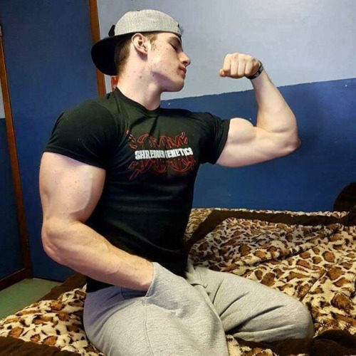 John fondled his massive member as he sat on his roommates bed. He admired his own god like muscles as he grew hard and laid back on the bed. He slowly took off his shirt. He pulled his sweats down over his bubble ass. John spread his goliath body across