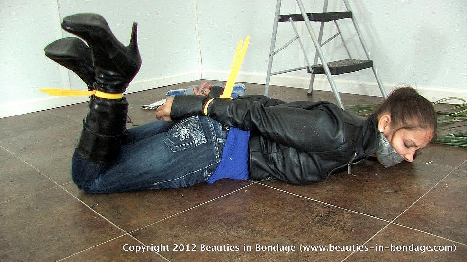 stacykdid:  Bound In A Zip - Ladies bound with zip ties, and of course, gagged.