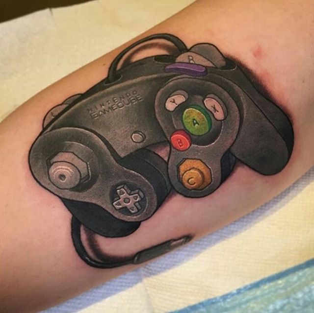 I love my new Gamecube controller tattoo I cant wait to be covered one  day      gamecube gamecubeco  Nintendo tattoo Gamer tattoos Gamecube  controller