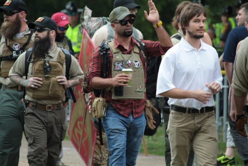 wespennest:  These are people who marched in with the “fraternal order of alt knights,” as evidenced by the “circle v” and flag patch. Really, they should be called the “scotch gard” because their leader, Kyle Chapman, gets high by huffing