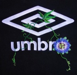 chromet:  Hand embroidered Umbro logo  Via