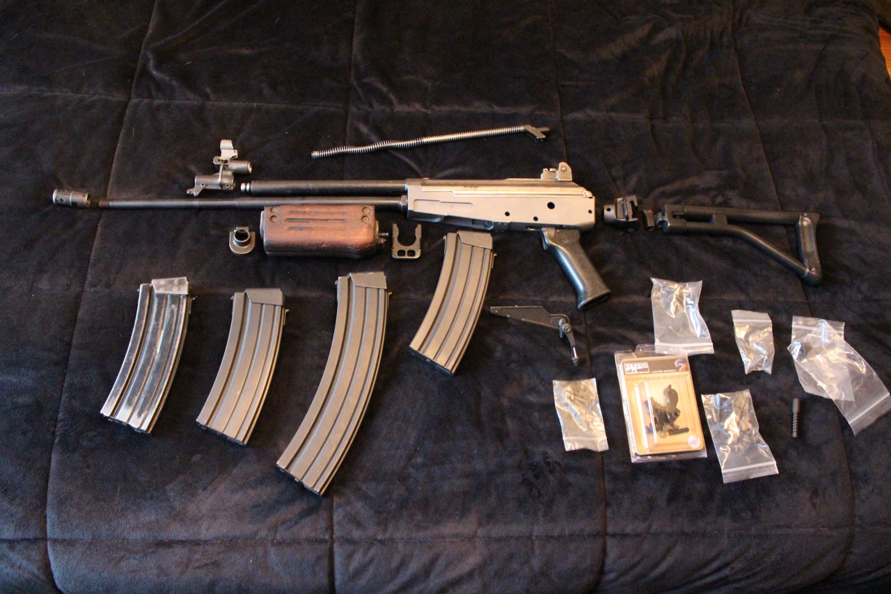 rtf-j:  My Galil. Israeli parts on a US (AOW) receiver. Was such a nightmare to build