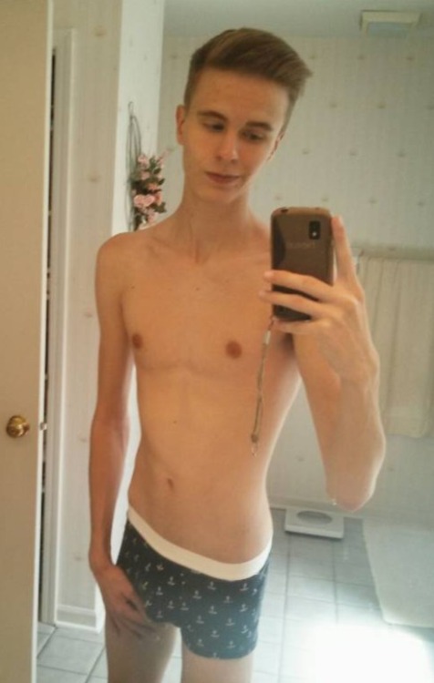 Slim twink showing off his bulge. Hot!