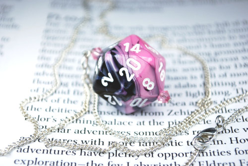 Nerd Cred is excited to introduce Gamer Jewelry!!! This is a beautiful Pink and Black D20 (20 sided 