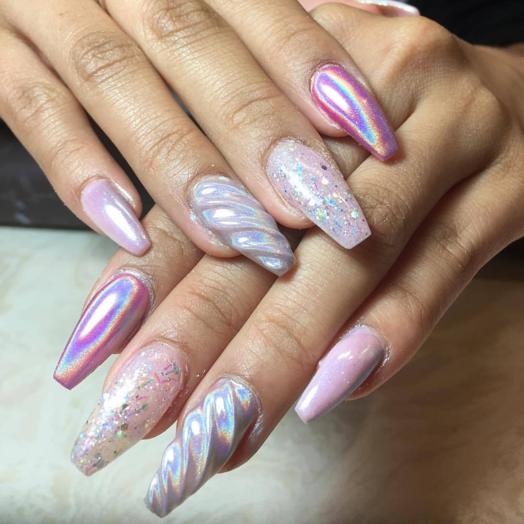 This nail artist combined the unicorn and fidget spinner trends, and  somehow put them on nails - HelloGigglesHelloGiggles