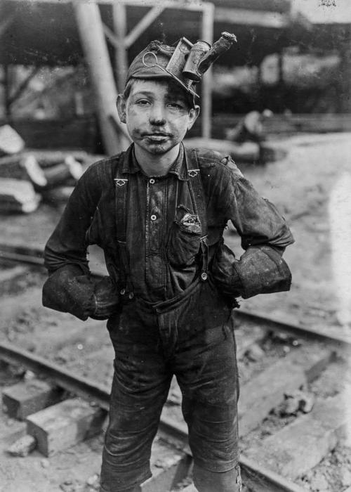 blondebrainpower:A tipple boy at Turkey Knob Mine in Macdonald, West Virginia. 1908.A tipple boy was a worker who worked in the tipple, a structure used at a mine to load coal for transport, typically into railroad hopper cars. Since tipple workers in