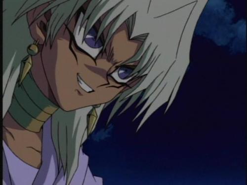 thewittyphantom:  Today, on ‘stuff that was in the opening but not in the actual show’, here’s Marik and Yami Yugi facing off in person. 