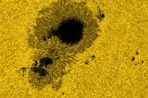 SunspotSunspots are temporary phenomena on the Sun’s photosphere that appear as spots darker t