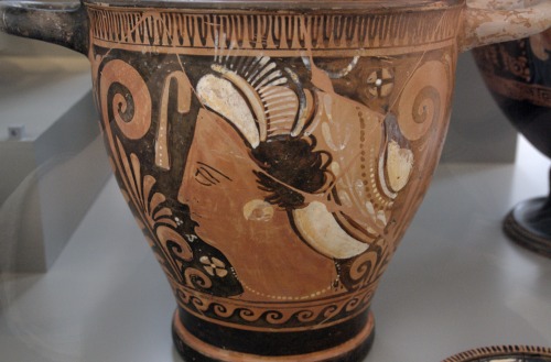 The head of a woman.  Apulian red-figure skyphos, attributed to the Armidale Painter; ca 340 BC
