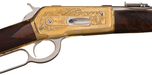 John Ulrich gold plated and factory presentation engraved Winchester Model 1886 lever action saddle 