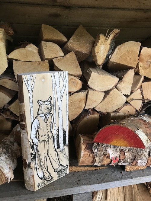 theseavoices:A 1940′s werewolf on birch with ink and resin. He is shiny!