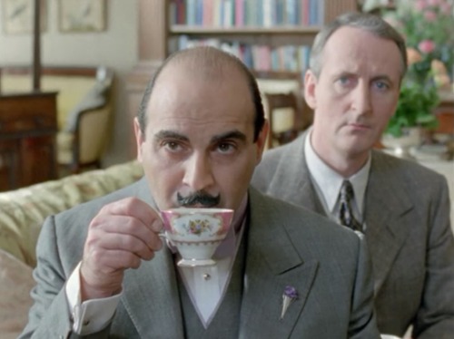 littlebitsofpoirot: The neatest cup of tea Poirot has ever drunk. Looks too English to believe it!