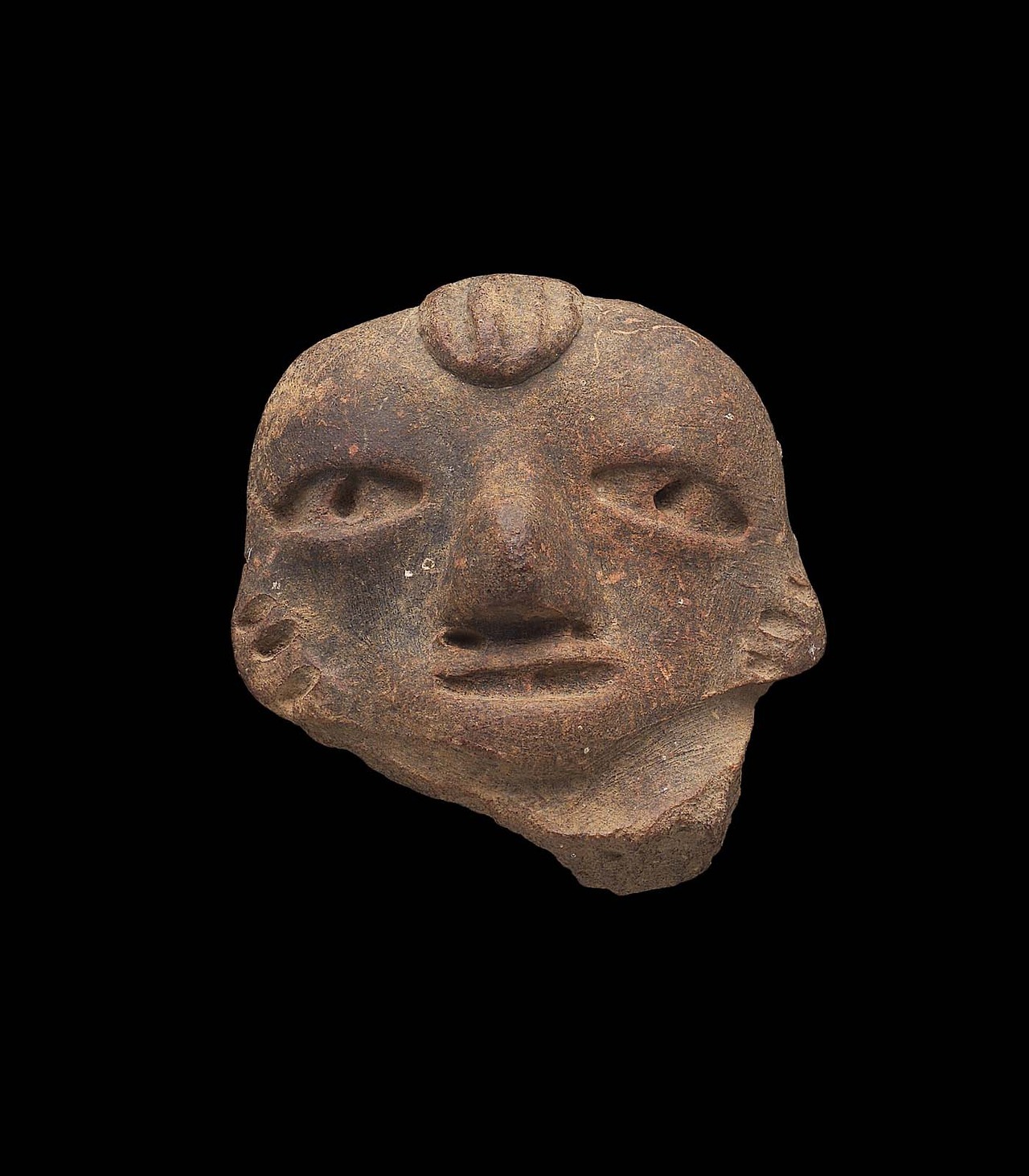 tlatollotl:
“ Human effigy head Mexico
Middle Preclassic period, 800–400 B.C.
Object Place: México, Central Highlands (?)
“ Human head broken from a large, slab figurine. The mouth, pupils and ears are indicated by wide, punctate-incised lines. A...